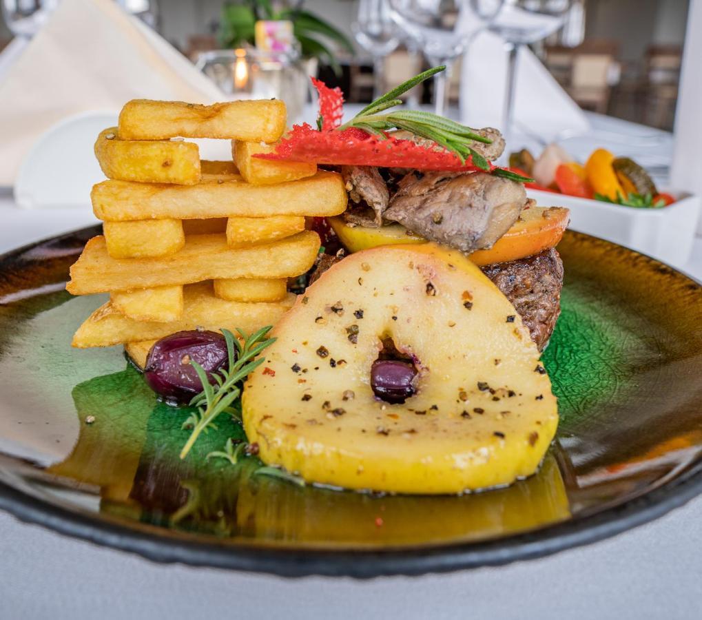 Boutique Odyseja & Spa Ciechocinek Exterior photo A plate of food